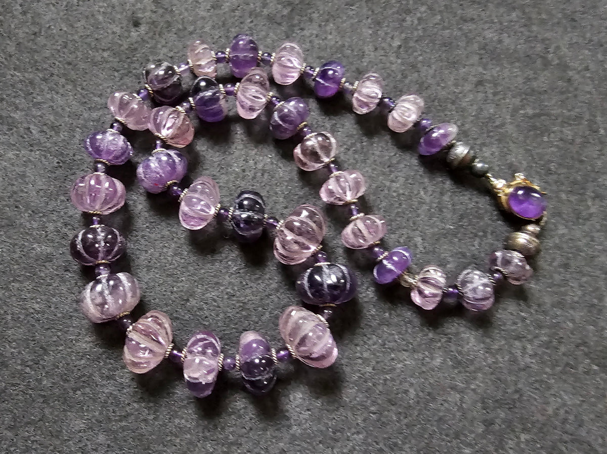 A Necklace of Vintage Carved Amethyst and Silver – Crossroads Jewelers