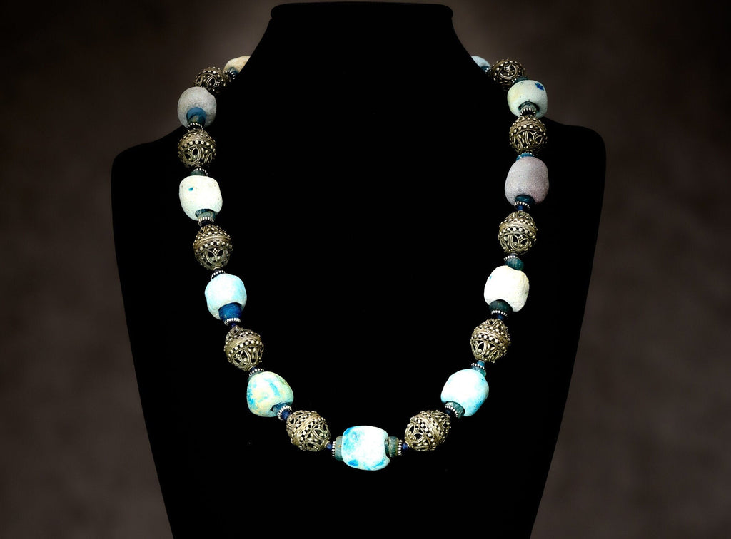 A Necklace of Ancient Persian Faience, Ancient Nila Beads from West Africa, and Yemenite Silver Beads