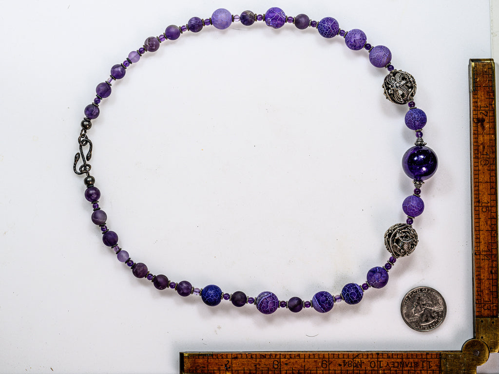 A 20" Necklace of Amethyst, Purple Fire Agate and Silver Dragon Beads