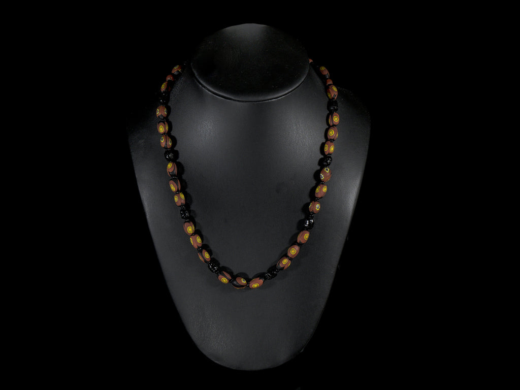 A Necklace of Vintage Brick Red Eye and Black  Murano Glass Beads