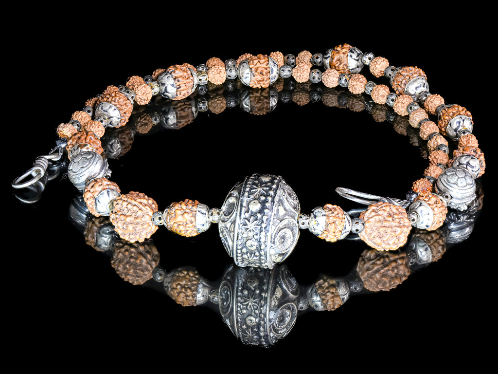 A Necklace of Tibetan Rudraksha Nut Beads and Silver