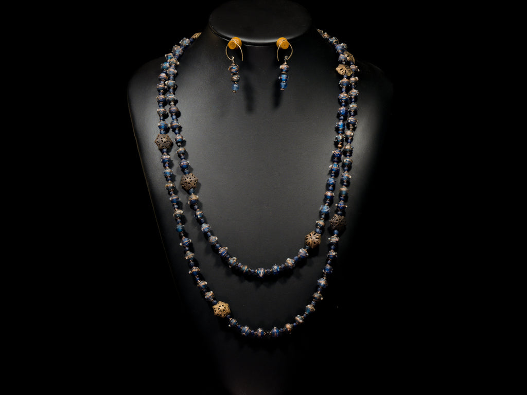 A Long Necklace of Translucent Blue and Gold Antique Glass and Antique Octagon Brass Beads With Matching Earrings