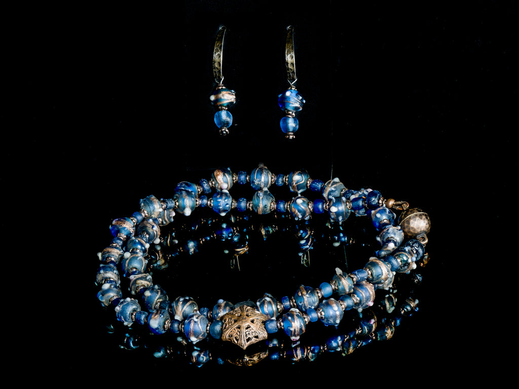A Short Necklace of Translucent Blue and Gold Antique Glass and Antique Octagon Brass Beads With Matching Earrings