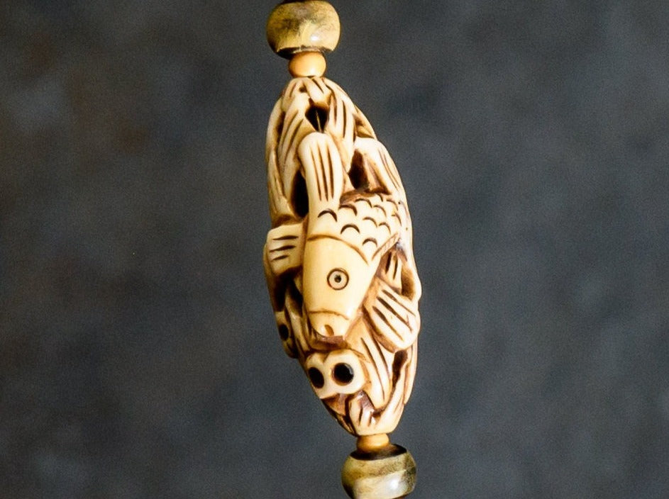 Carved Cattlebone and Bamboo Necklace