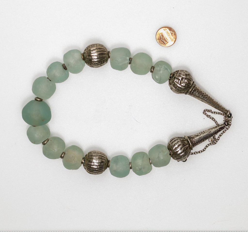 A Necklace of Aqua Blue Krobo Glass and Antique Ethiopian Muria Silver Wedding Beads