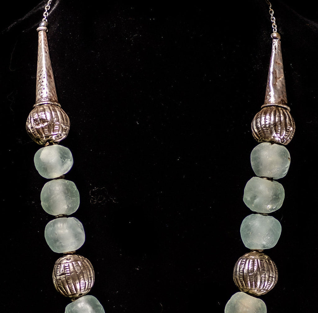 A Necklace of Aqua Blue Krobo Glass and Antique Ethiopian Muria Silver Wedding Beads