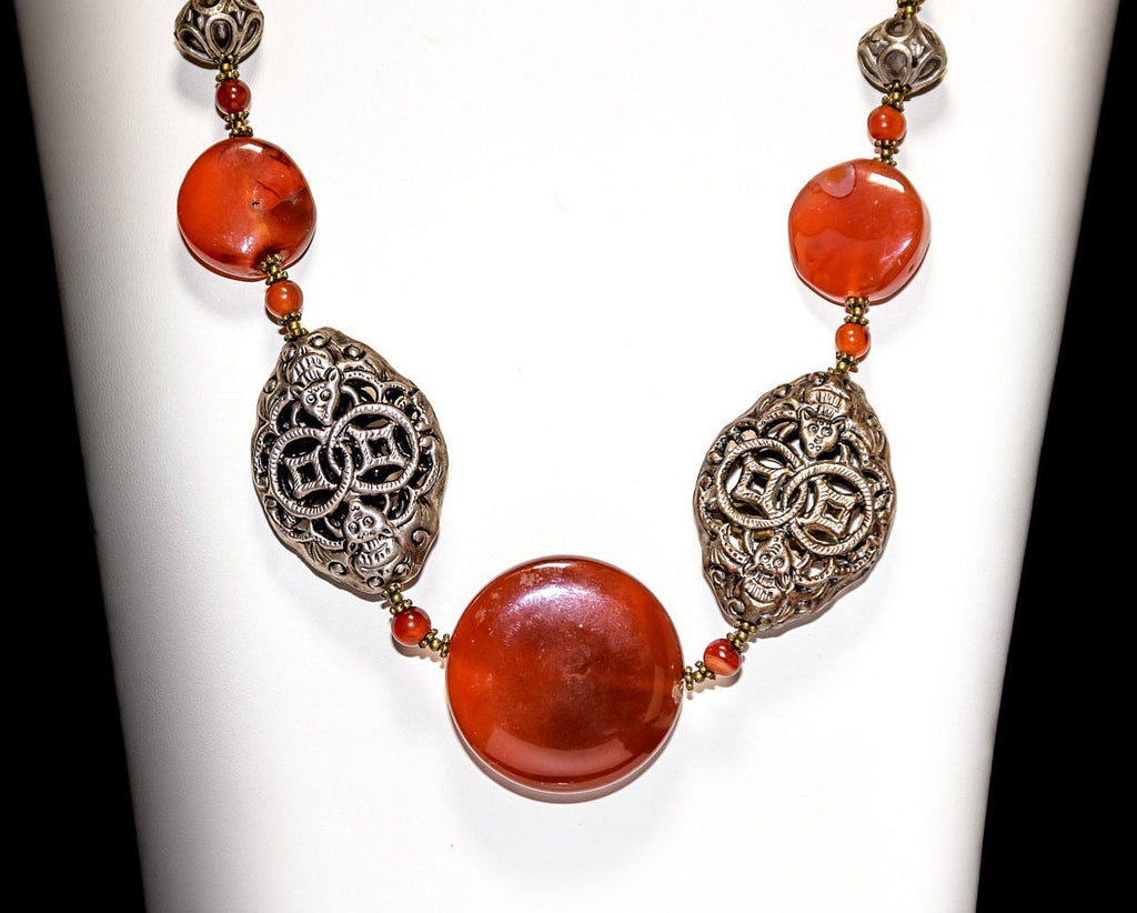 A Necklace of Antique African Trade Coin Carnelian Beads Strung with Moroccan Ethnic Beads