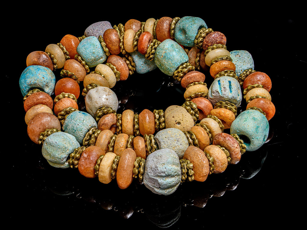 A Necklace of Ancient Persian Faience, Ancient Carnelian, and African Brass Aja Beads