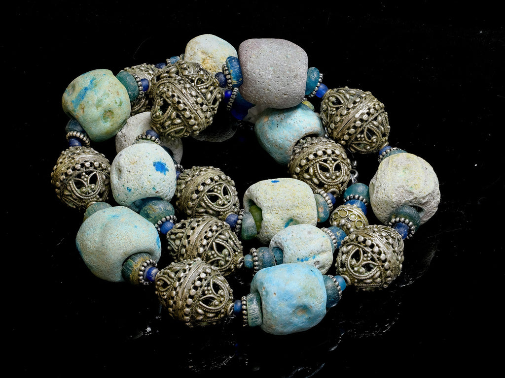 A Necklace of Ancient Persian Faience, Ancient Nila Beads from West Africa, and Yemenite Silver Beads