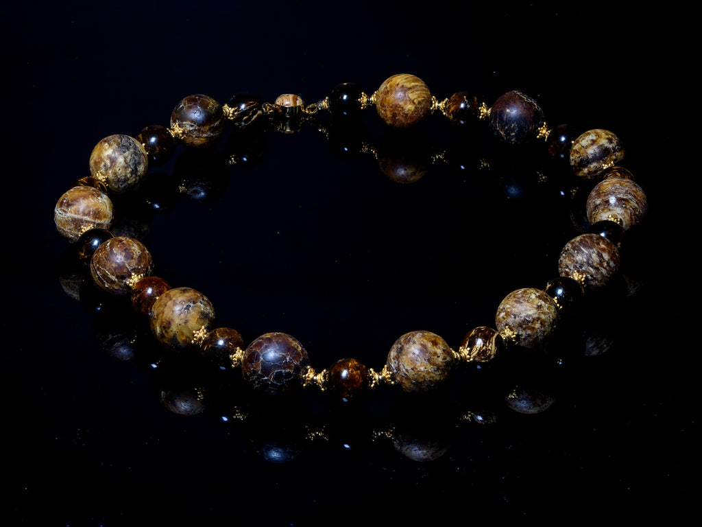 A Necklace of Rare Fushun Amber,  Columbian Copal and 18K Gold Vermeil (X10)