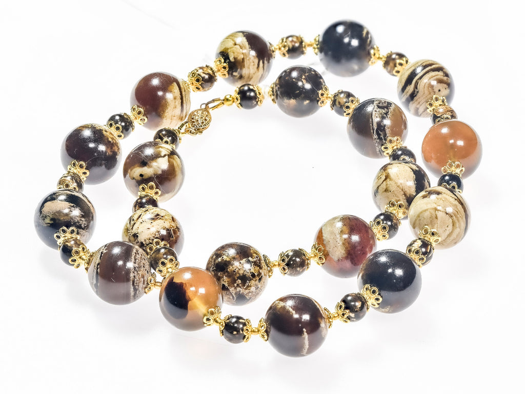 A Necklace of Sumatran Amber, Rare Fushun Amber from China, and 18K Gold Vermeil (X12)