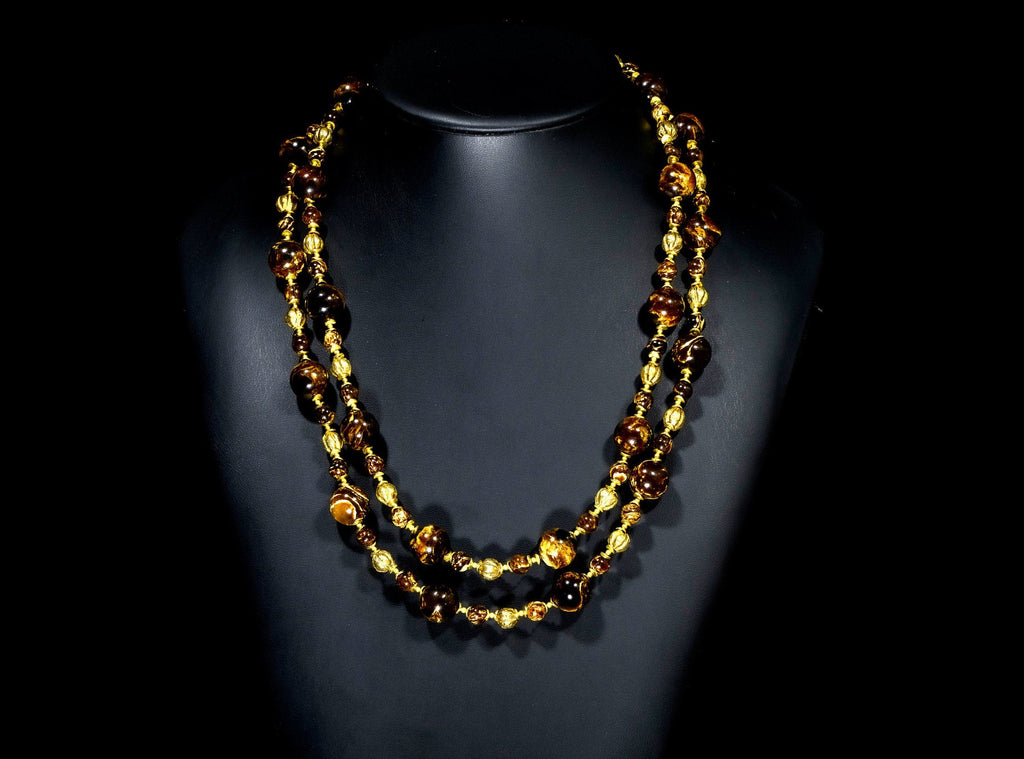 A Long Necklace of Rare Fushun Amber from China, 18K Gold Leaf "Lost Wax" beads, and 18K Gold Vermeil (X13)
