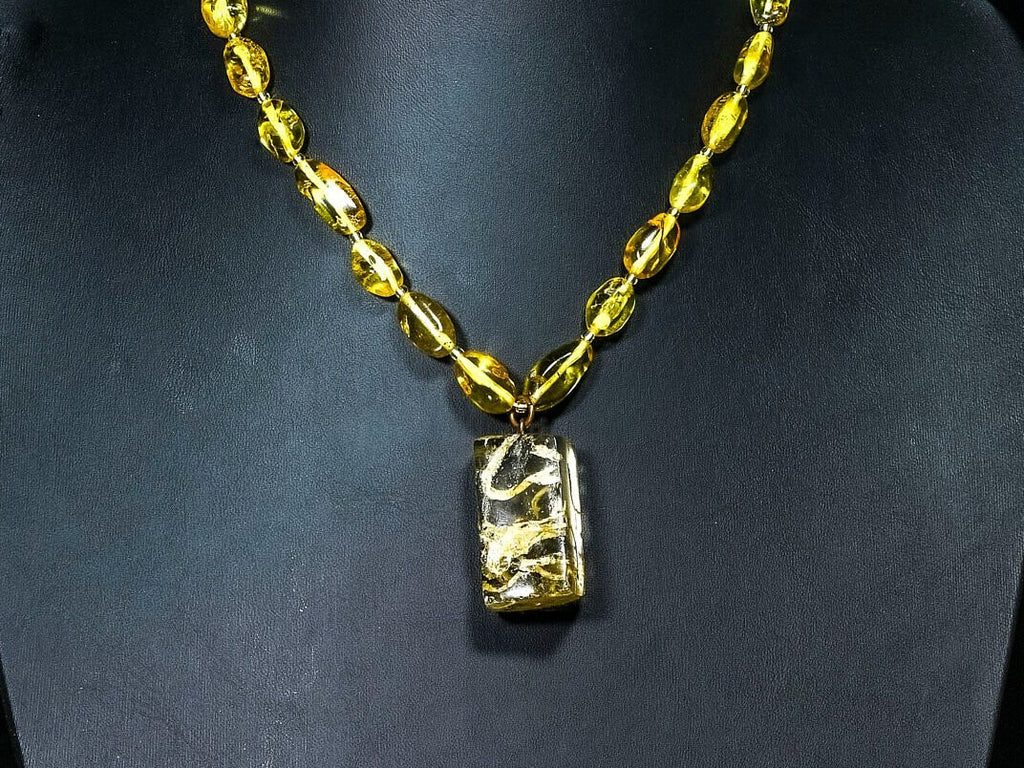 A Necklace of Ukrainian Amber with a Columbian Copal Pendant with Inclusions (Y08)